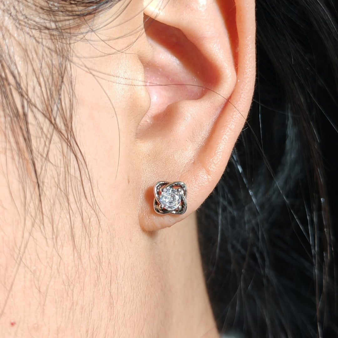 LOVEBUFF Platinum Plated Copper Four-Petal Flower Zircon Stud Earrings