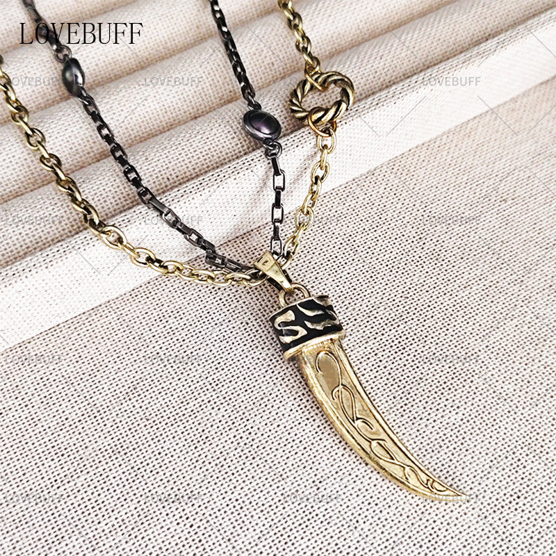 LOVEBUFF LAD Sylus Where Hearts Live Wolf Tooth Shaped Pendant Necklace (preorder ships in 1 week)